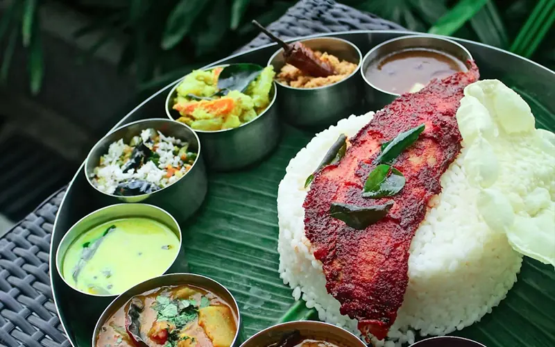 Kerala cuisine — seafood, appams, thalis, and food trails around Kochi